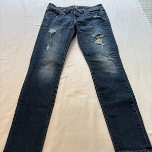 Mid-Rise Ankle Legging with button and zip fly closure, five pockets, skinny leg